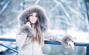a girl in a fur winter coat